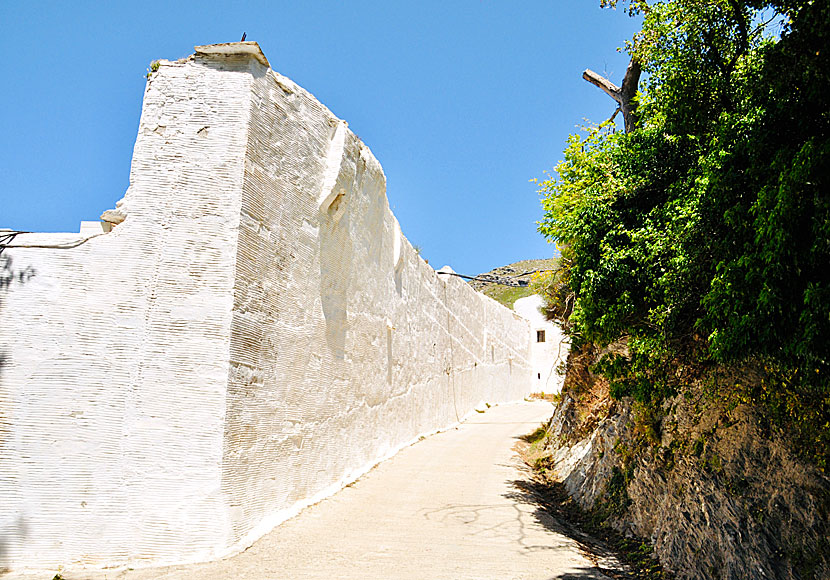 Massive stone walls surround the complex around the Monastery of Panachrantos, resembling more a fortress than a monastery.