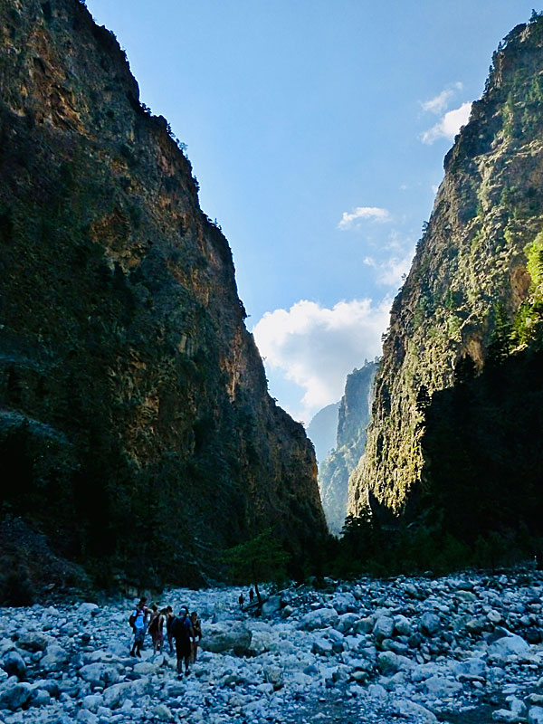 Hiking in the Samaria Gorge in Crete can be done on your own or with a guide.