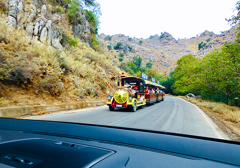 The Little Fun Train on its way up to the village of Theriso through the gorge of the same name.