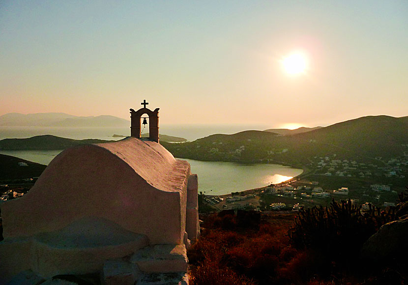 The sun reflects on Agios Georgios church above Chora on Ios.