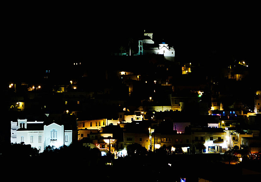 The churches of Chora in Ios are illuminated at night.