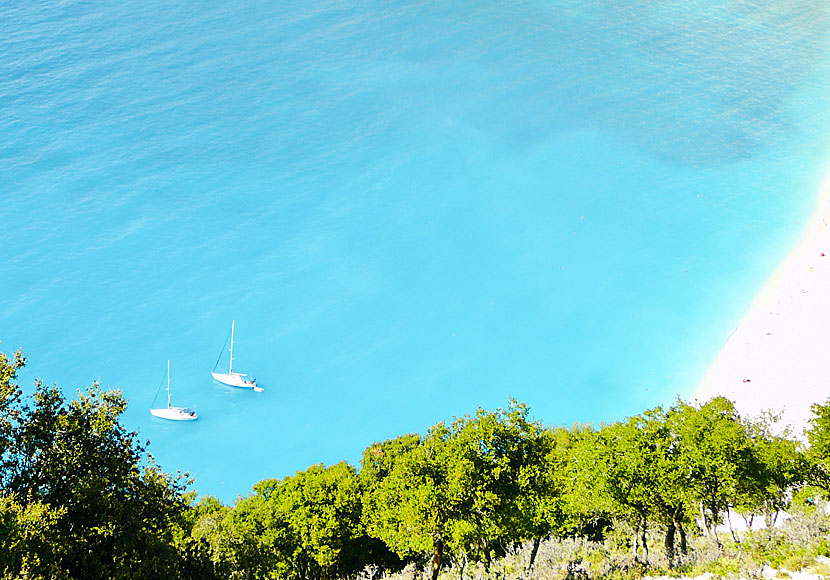 Sailboats at Myrtos beach on Kefalonia in the Ionian archipelago.