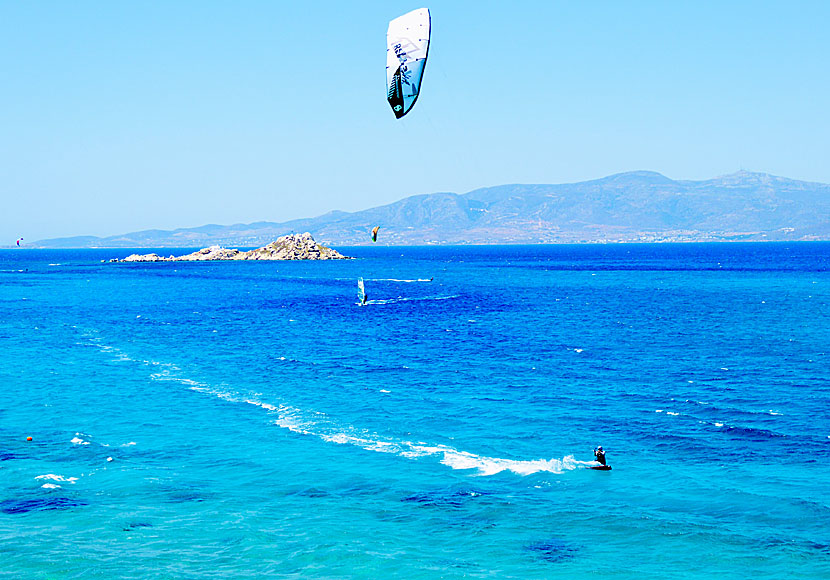Kitesurfers and windsurfers at Mikri Vigla beach in Naxos.