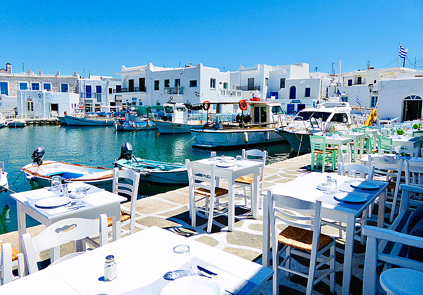 The cozy fishing port with tavernas and cafes in Naoussa. Paros.