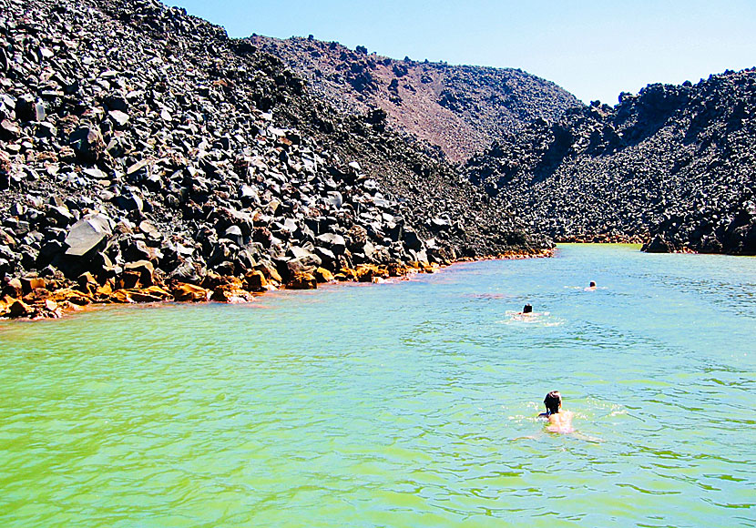 You can swim in the hot springs in Nea Kameni. Santorini.