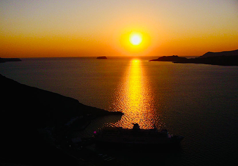 The sunset seen from a ferry heading to the port of Athinios on Santorini.