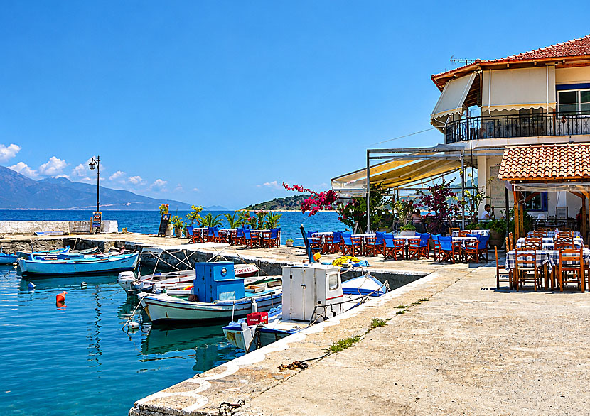 Kalamos village is small, and the harbor, boats, tavernas, and everyday life take center stage.