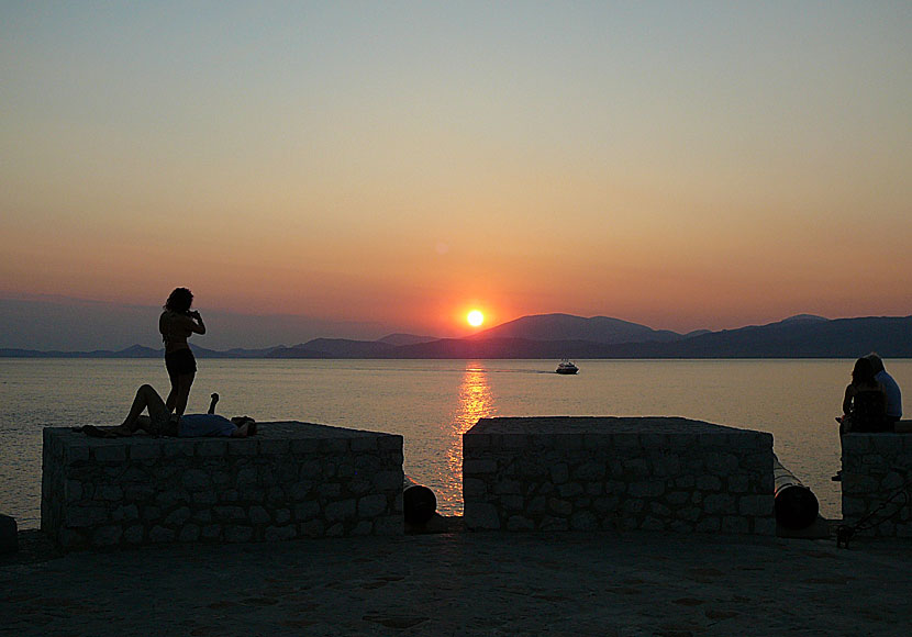 The beautiful sunset seen from the port of Hydra town.
