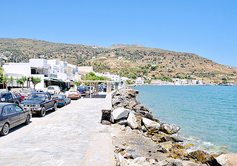 The harbor promenade in Ormos is lined with tavernas and restaurants.