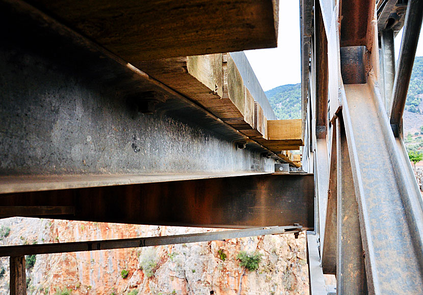 The Aradena Bridge is built of iron and thick wooden planks.