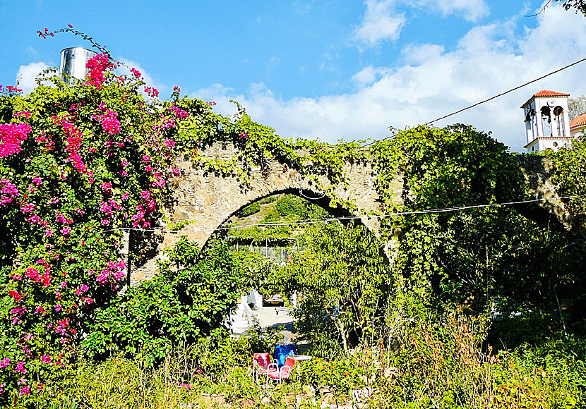 The old stone bridge and church in the village of Elos in Crete.