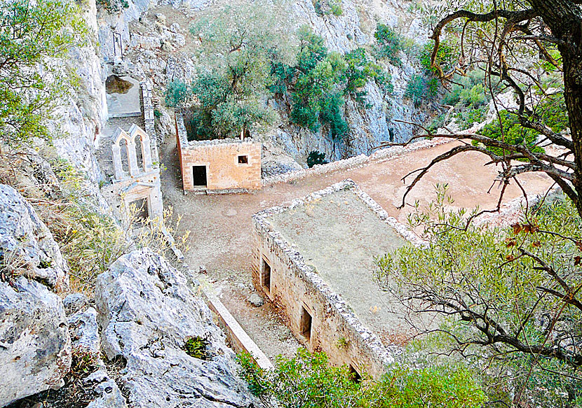 From the Katholiko Monastery, an old stone bridge crosses a deep stream ravine.