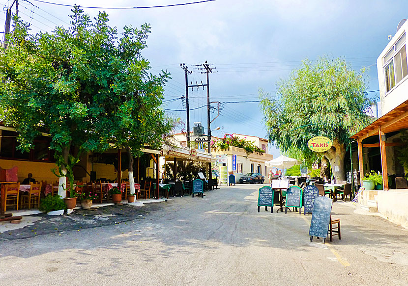 Restaurants in the square in the village of Plaka above Almyrida in Crete.