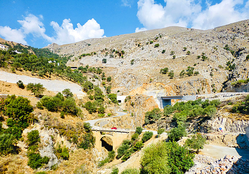 The old stone bridge and the new concrete bridge crossing the gorge in Rodakino in Crete.