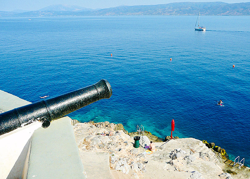 Cannons and rock baths at Hydra in Greece.