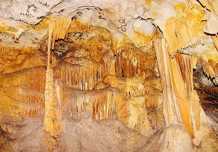 Stalagmites and stalactites in the cave with a church on Iraklia.