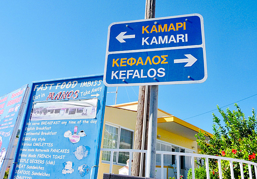 Kamari beach on the left and the village of Kefalos on the right.