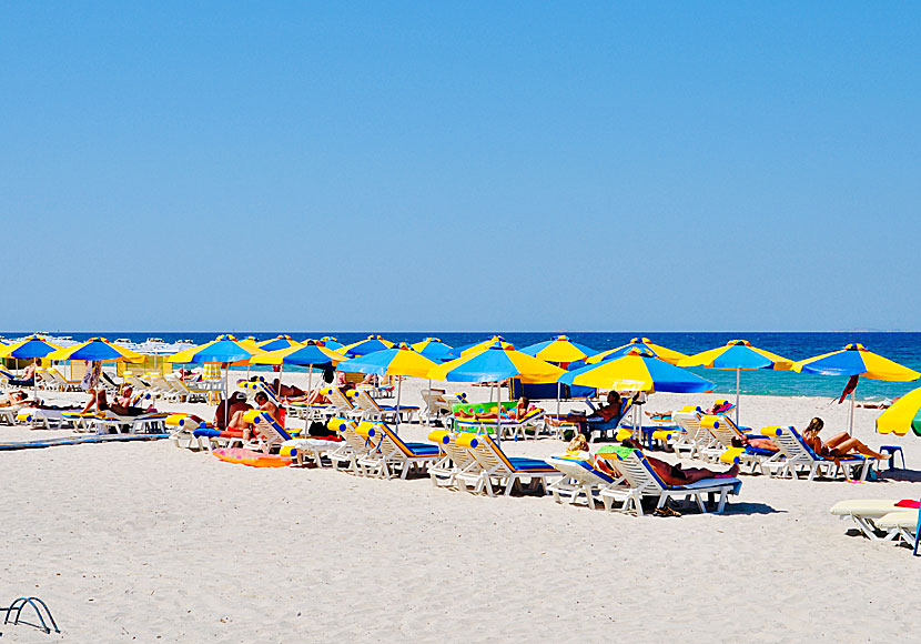 Rent sunbeds and parasols on the beach in Marmari.