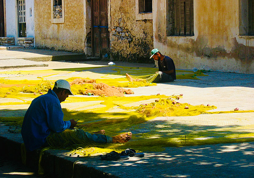 Fishermen mending their nets in Moutsouna.
