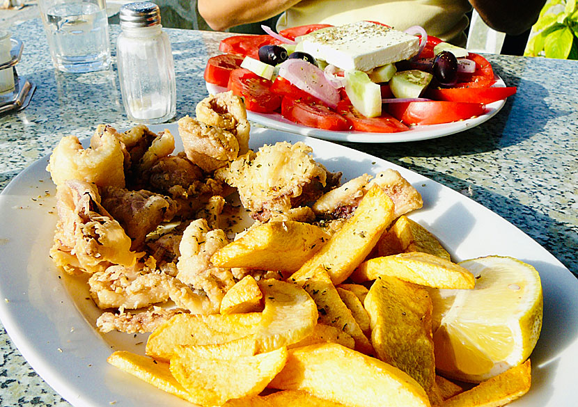Eating fresh calamari on Naxos in Greece.
