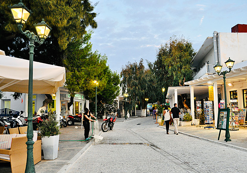 The main street with restaurants in Naoussa. Paros.