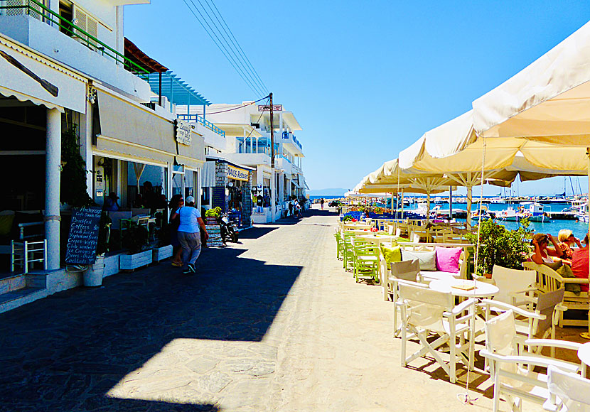 The beach promenade in Piso Livadi is lined with shops and restaurants.