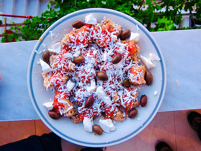 Starters and appetizers from Greece. Cretan Rusk - Dakos - is moistened barley rusk covered with tomato, feta cheese and oregano.