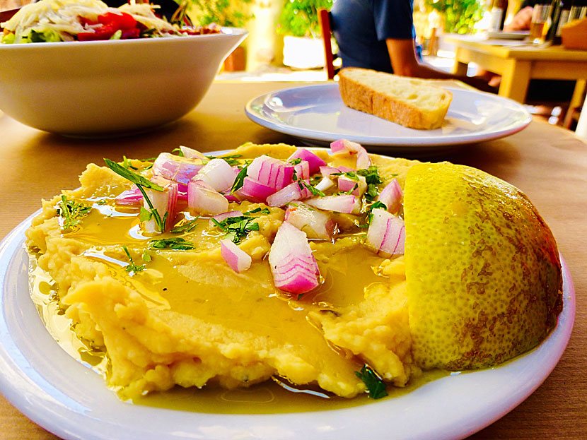 Starters and appetizers from Greece. Fava with red onion and lemon.