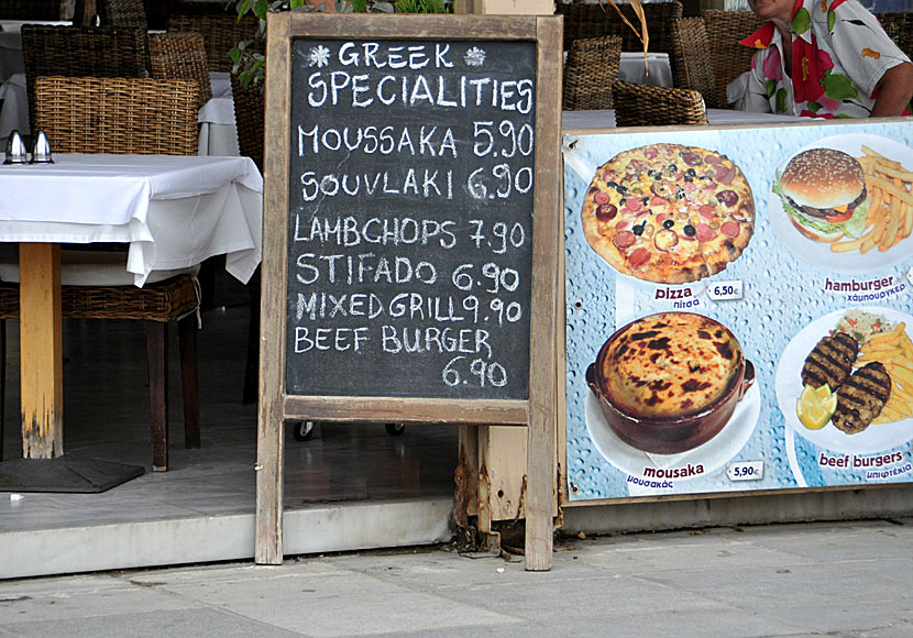 Moussaka, souvlaki, saganaki, tzatsiki and stuffed tomatoes at Naxos restaurants and tavernas.