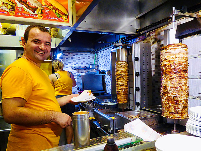 Main dishes from Greece. Gyros with pita bread - Gyros me pita - is pork or chicken cooked on a large vertical spit.