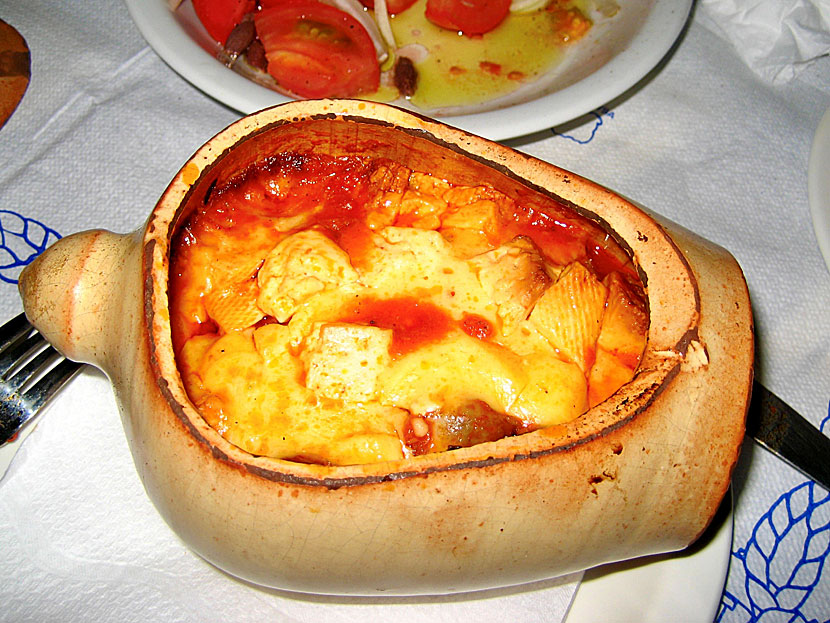 Main dishes from Greece. Kleftiko is a lamb stew with potatoes, garlic, herbs and cheese that is cooked slowly in the oven.