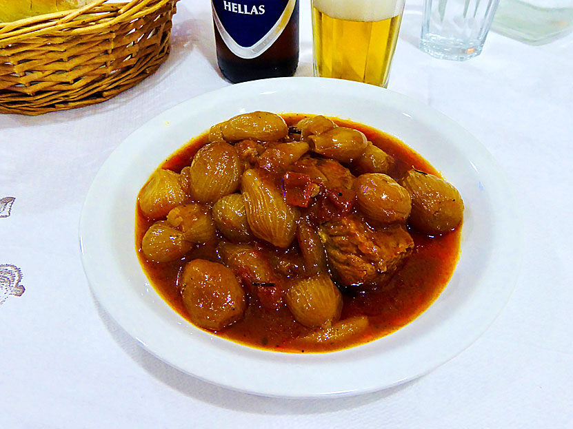 Main dishes from Greece. Stifado is a tasty meat stew with small onions or chopped large onions.