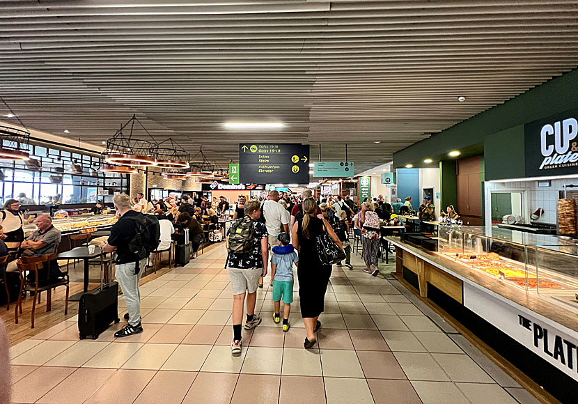 There are several restaurants, fast food places, kiosks, cafes and bars inside the security checkpoint at Rhodes Airport.