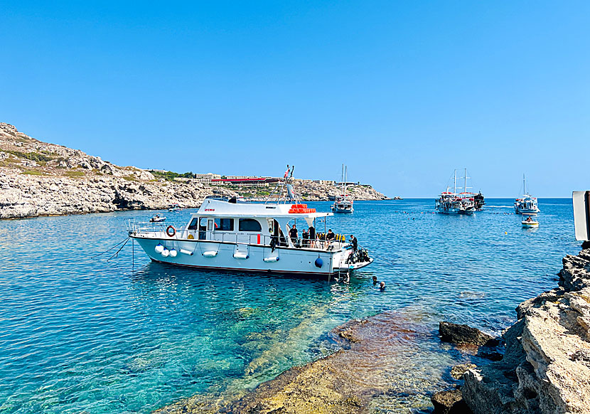 Diving boats and excursion boats in Kallithea Bay in Rhodes.