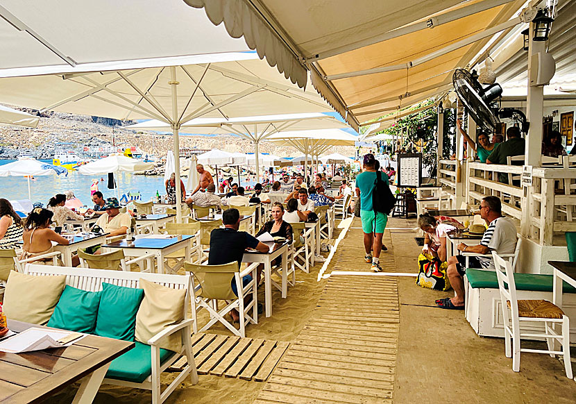 Cafes and bars along the beach promenade at the beaches of Lindos.