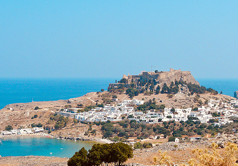 Lindos beach, Pallas beach, Lindos village and Acropolis on Rhodes in Greece.