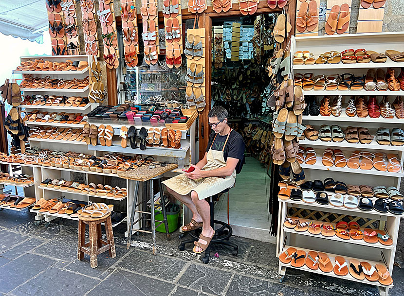 Leather shops and cobblers selling bags and sandals in the old town.