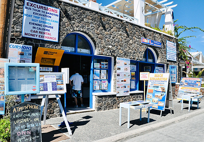 One of many travel agencies that sell various excursions in Santorini.