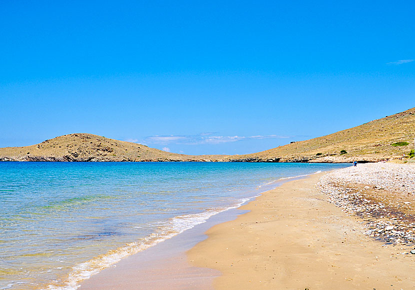 The sandy Delfini beach on the island of Syros in Greece.