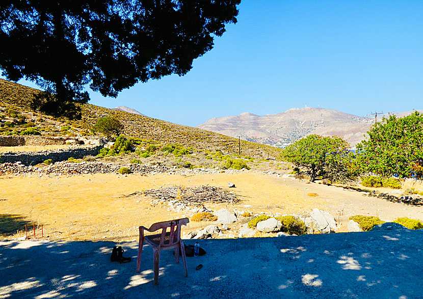Outside the church there are some worn chairs to rest in after the killer slope.