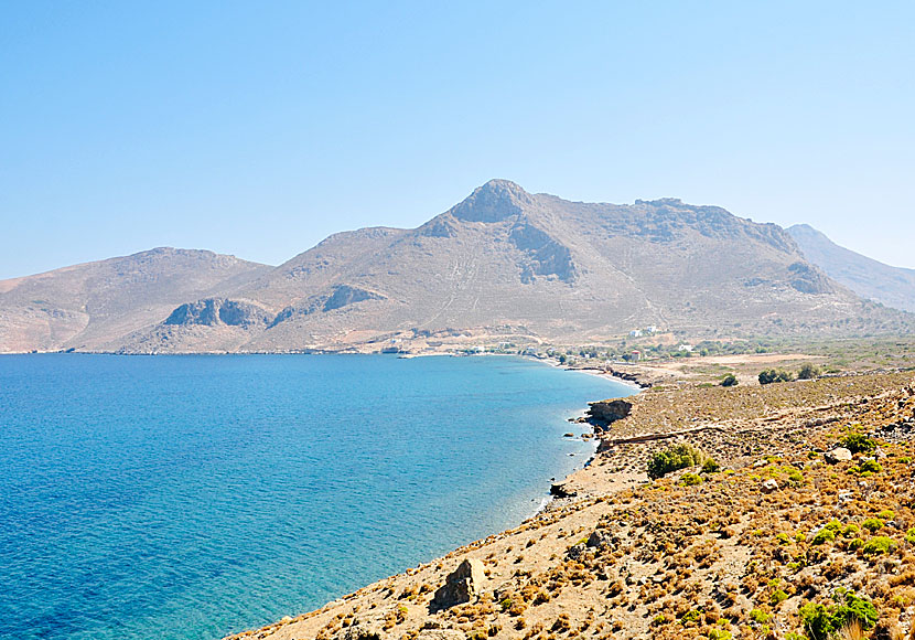 The bay where Mylos beach and Agios Antonios are located below Megalo Chorio on Tilos in Greece.