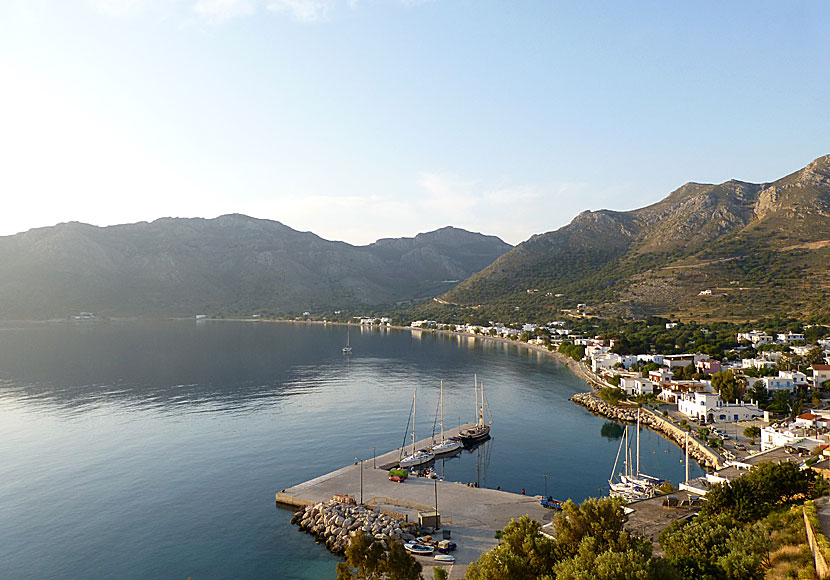 The port and beach of Livadia on Tilos when the sun rises.