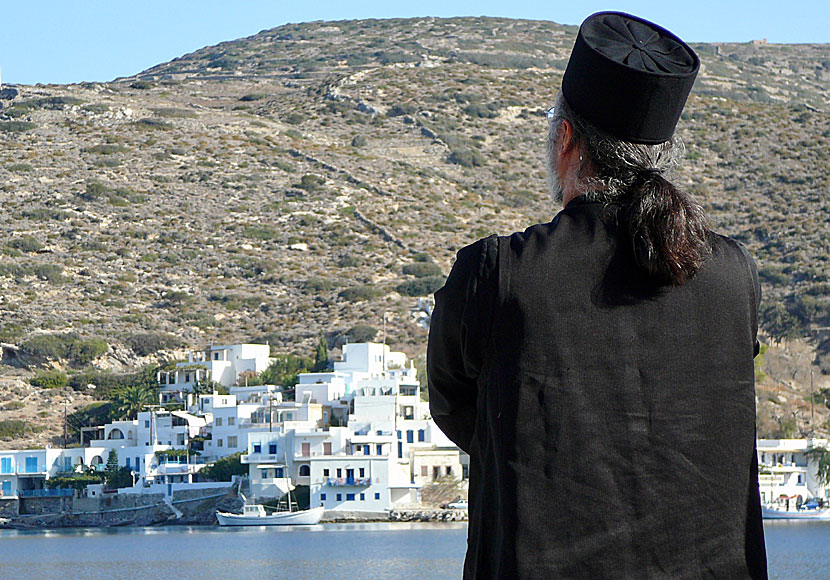 Man in the long black coat  with Bob Dylan in Katapola on Amorgos.
